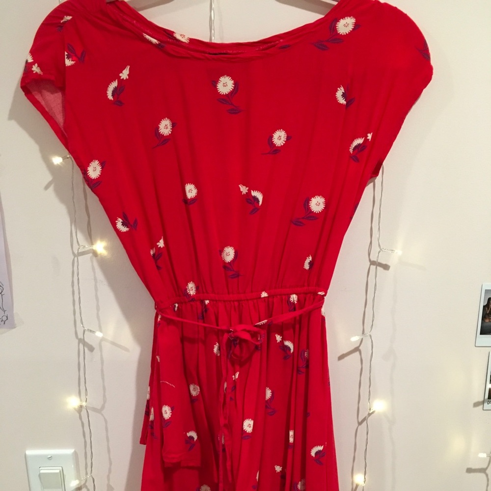 red with flower patterned dress